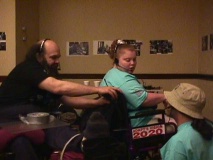 Radio Checks - 
Roland hooks up Shona Eakin with a radio at ADAPT action